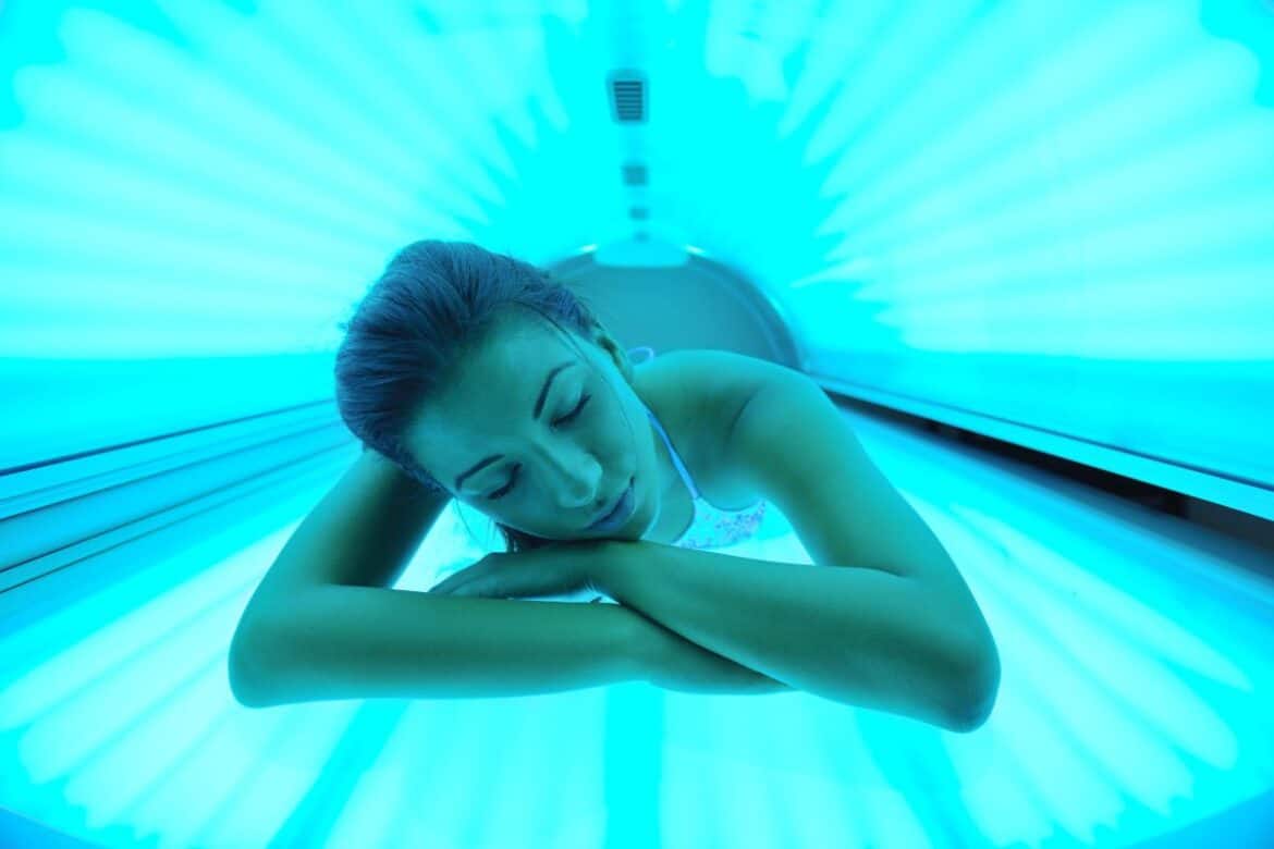 Woman Laying In Tanning Bed